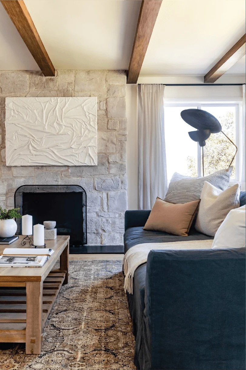 Living room fireplace and exposed timber beams