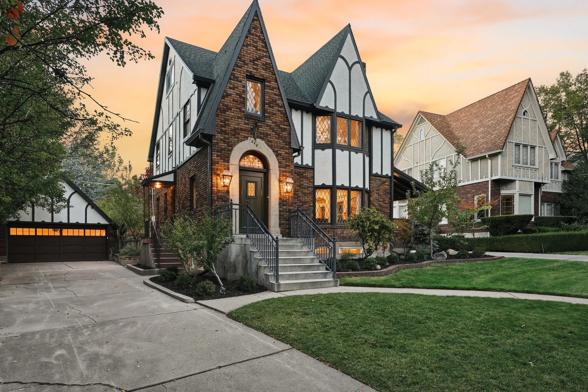 Restored Tudor exterior on Princeton Avenue at dusk